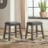 Caitbrook Counter Height Dining Room Set W/ Stools