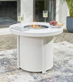 Sundown Treasure Fire Pit Table Set W/ Black Chairs -Ashley P011 776 table 2