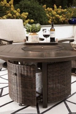 Paradise Trail Round Fire Pit Table -Ashley P750 776 table 3