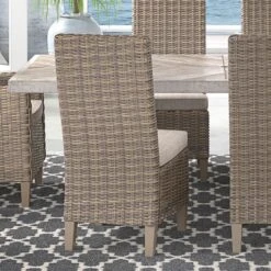 Beach Front Outdoor Trestle Dining Set W/ Beachcroft Chairs And Bench 23 Beach Front Outdoor Trestle Dining Set W/ Beachcroft Chairs And Bench -Ashley P791 601 chair 1 1